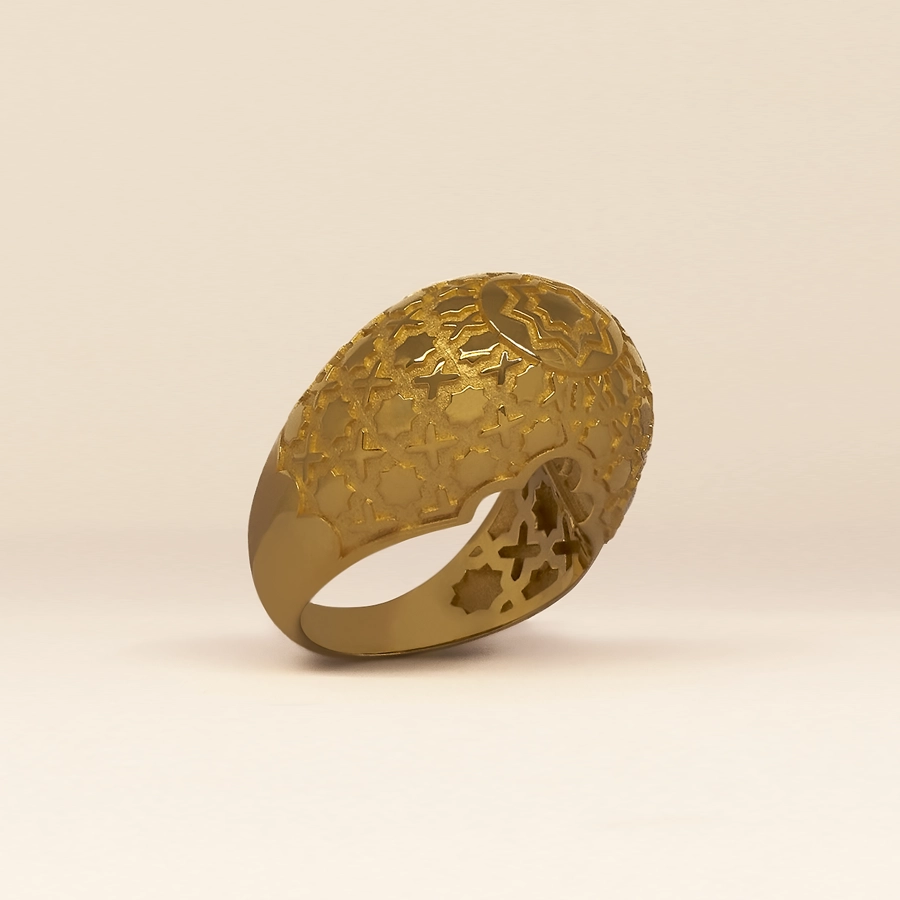 Gold dome ring with openwork star pattern inspired by Córdoba horseshoe arches.