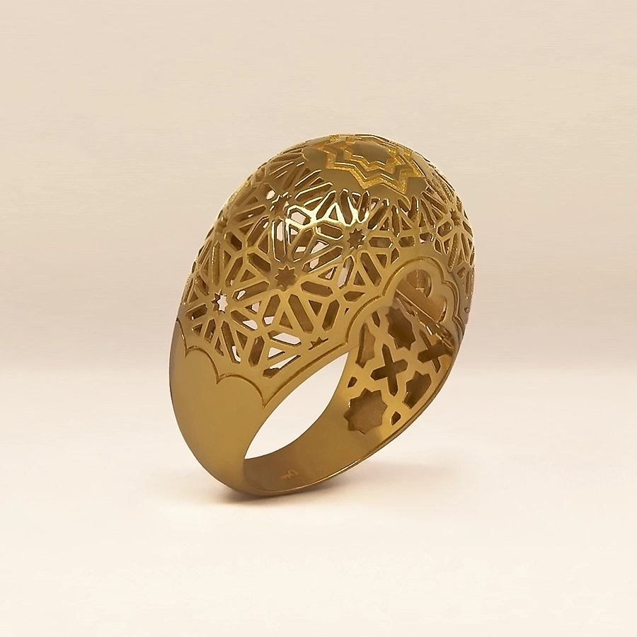 Gold-plated filigree dome ring with central star and Córdoba-inspired design.